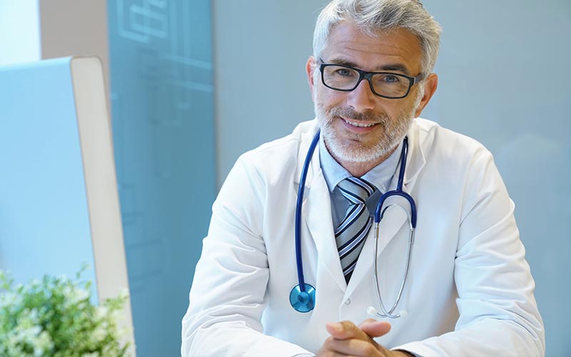 Doctor administering vaccinations to meet requirements